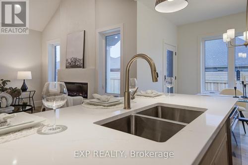 19 Carriage Crossing, Mapleton, ON - Indoor Photo Showing Kitchen With Double Sink