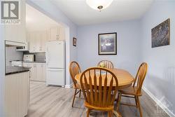 The kitchen is right off dining area, making serving and hosting a breeze. - 