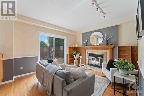 2741 Massicotte Lane, Ottawa, ON - Indoor Photo Showing Living Room With Fireplace