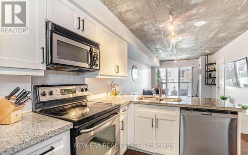 610 - 1005 King Street, Toronto, ON - Indoor Photo Showing Kitchen With Double Sink With Upgraded Kitchen