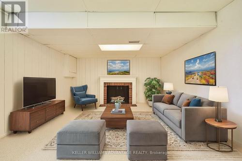 195 Bridletowne Circle, Toronto, ON - Indoor Photo Showing Living Room With Fireplace