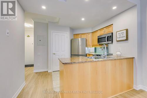 101 - 40 Old Mill Road, Oakville, ON - Indoor Photo Showing Kitchen With Double Sink