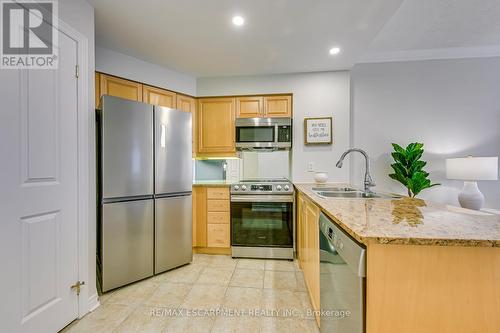 101 - 40 Old Mill Road, Oakville, ON - Indoor Photo Showing Kitchen With Double Sink