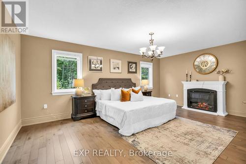 30 Bamburg Street, Georgina, ON - Indoor Photo Showing Bedroom With Fireplace