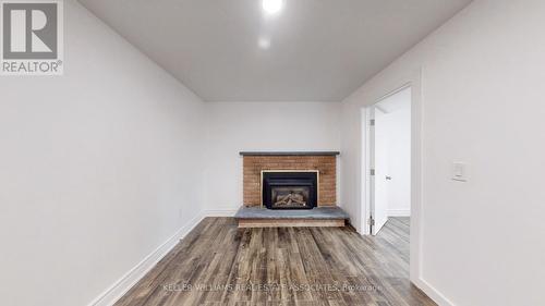 11 Abell Drive, Brampton, ON - Indoor Photo Showing Living Room With Fireplace