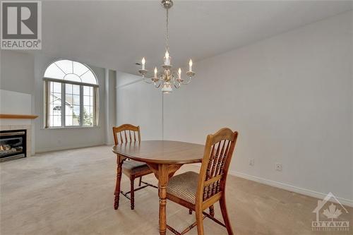 44 Briston Private, Ottawa, ON - Indoor Photo Showing Dining Room With Fireplace