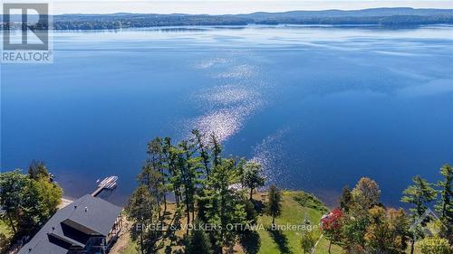 5349 Calabogie Road, Greater Madawaska, ON - Outdoor With Body Of Water With View