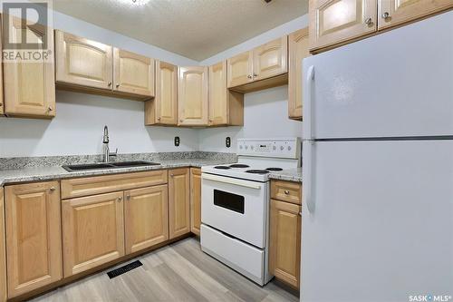 1404 Wascana Street, Regina, SK - Indoor Photo Showing Kitchen With Double Sink