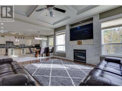 3022 Maurice Drive, Prince George, BC - Indoor Photo Showing Living Room With Fireplace