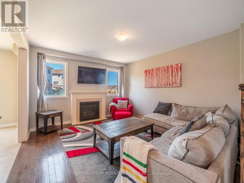 3046 Stone Ridge Boulevard, Orillia, ON - Indoor Photo Showing Living Room With Fireplace