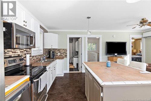 38 Summit Drive, Minto, NB - Indoor Photo Showing Kitchen With Double Sink With Upgraded Kitchen