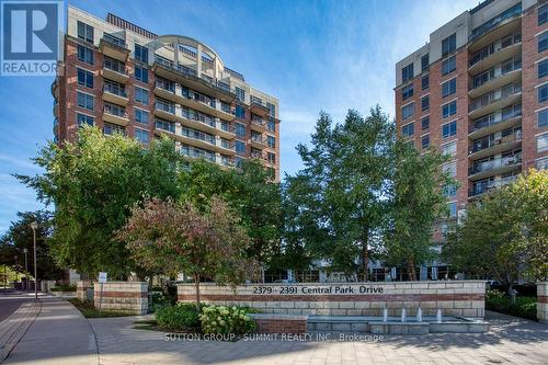 906 - 2391 Central Park Drive, Oakville, ON - Outdoor With Balcony With Facade