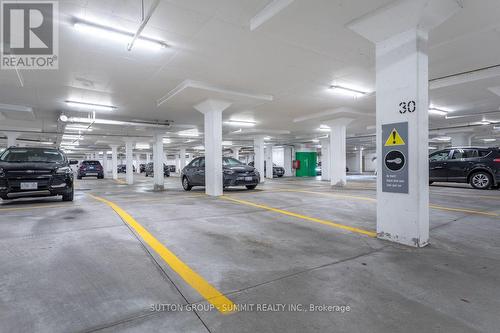 906 - 2391 Central Park Drive, Oakville, ON - Indoor Photo Showing Garage