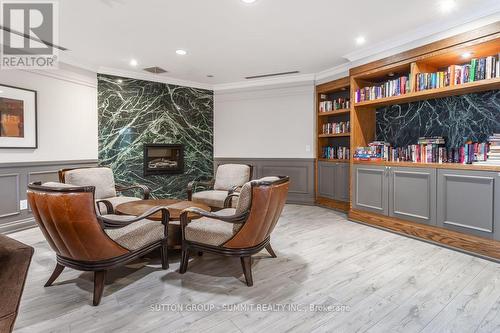 906 - 2391 Central Park Drive, Oakville, ON - Indoor Photo Showing Other Room With Fireplace