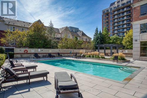 906 - 2391 Central Park Drive, Oakville, ON - Outdoor With In Ground Pool