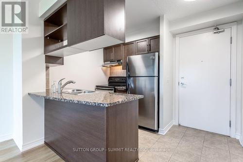 906 - 2391 Central Park Drive, Oakville, ON - Indoor Photo Showing Kitchen With Stainless Steel Kitchen With Double Sink