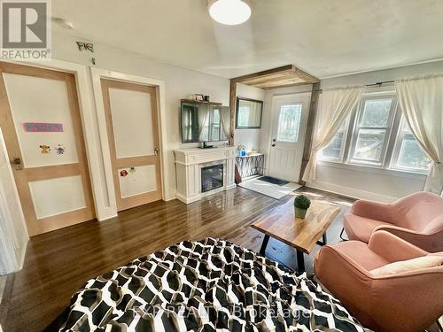 89 Washington Street, Brant, ON - Indoor Photo Showing Living Room With Fireplace