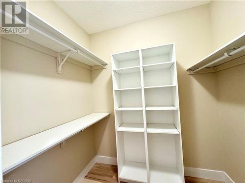 Walk in closet for the primary bedroom - 15 Nyah Court, Tiverton, ON - Indoor With Storage