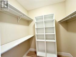 Walk in closet for the primary bedroom - 