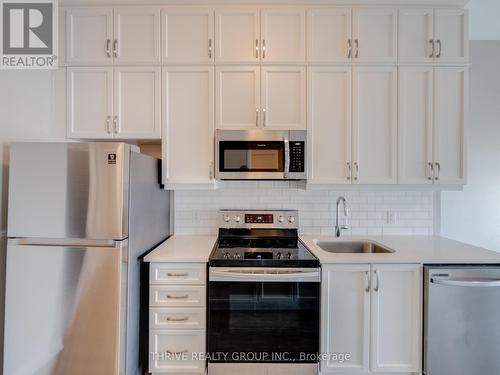 Lots Of Cabinets - 632 - 102 Grovewood Common, Oakville, ON - Indoor Photo Showing Kitchen