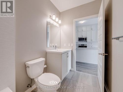 Upgraded Tiles in Washroom - 632 - 102 Grovewood Common, Oakville, ON - Indoor Photo Showing Bathroom