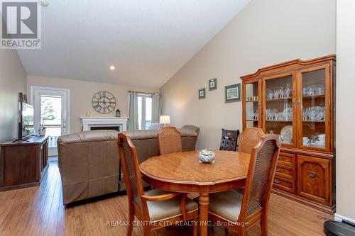 22 - 20 Windemere Place, St. Thomas, ON - Indoor Photo Showing Dining Room With Fireplace