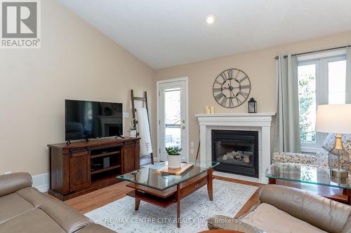 22 - 20 Windemere Place, St. Thomas, ON - Indoor Photo Showing Living Room With Fireplace