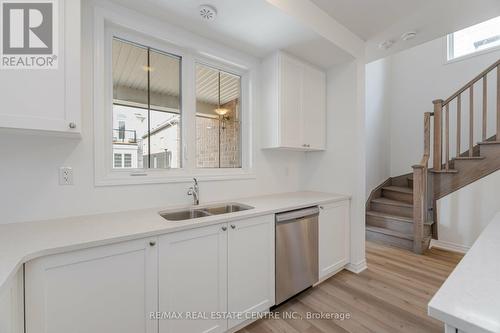 75 - 1317 Leriche Way E, Milton, ON - Indoor Photo Showing Kitchen With Double Sink