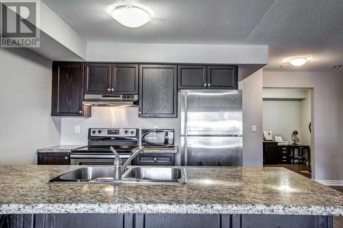 6 - 137 Isaac Devins Boulevard, Toronto, ON - Indoor Photo Showing Kitchen With Double Sink With Upgraded Kitchen