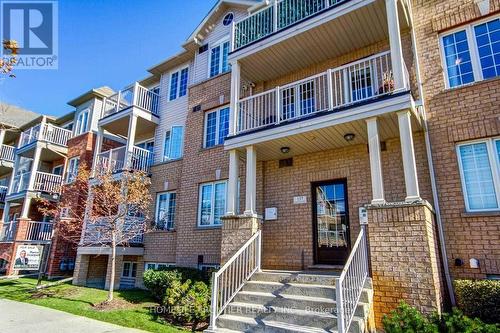 6 - 137 Isaac Devins Boulevard, Toronto, ON - Outdoor With Balcony With Facade