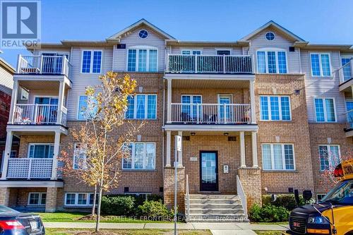 6 - 137 Isaac Devins Boulevard, Toronto, ON - Outdoor With Balcony With Facade