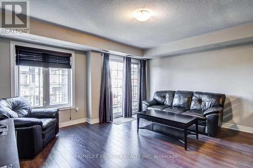 6 - 137 Isaac Devins Boulevard, Toronto, ON - Indoor Photo Showing Living Room