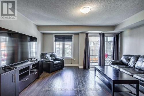 6 - 137 Isaac Devins Boulevard, Toronto, ON - Indoor Photo Showing Living Room