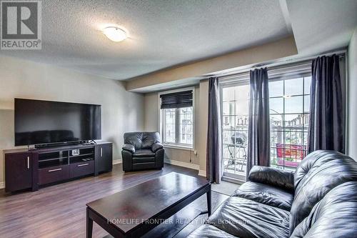 6 - 137 Isaac Devins Boulevard, Toronto, ON - Indoor Photo Showing Living Room