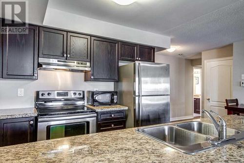 6 - 137 Isaac Devins Boulevard, Toronto, ON - Indoor Photo Showing Kitchen With Double Sink