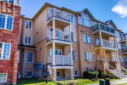 6 - 137 Isaac Devins Boulevard, Toronto, ON - Outdoor With Balcony With Facade