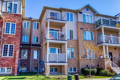 6 - 137 Isaac Devins Boulevard, Toronto, ON - Outdoor With Balcony With Facade