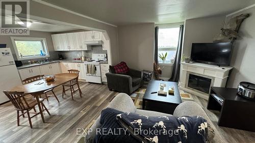 206 Eleventh Avenue, Cochrane, ON - Indoor With Fireplace