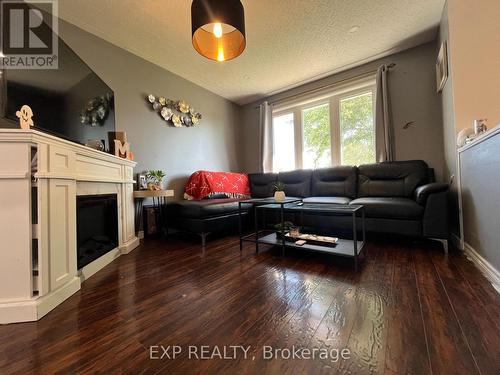 206 Ottolen Street, Timmins, ON - Indoor Photo Showing Living Room With Fireplace