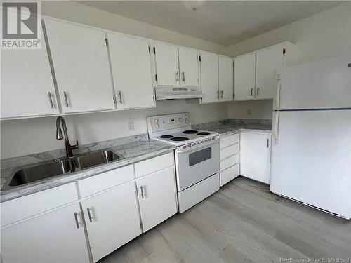 139-141 Paul Street, Rogersville, NB - Indoor Photo Showing Kitchen With Double Sink