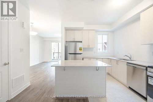 77 - 1317 Leriche Way, Milton, ON - Indoor Photo Showing Kitchen With Double Sink With Upgraded Kitchen