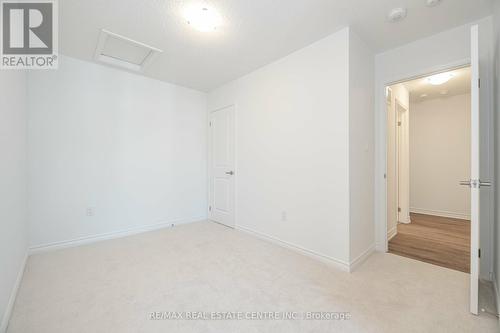 77 - 1317 Leriche Way, Milton, ON - Indoor Photo Showing Other Room