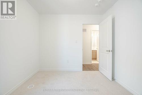 77 - 1317 Leriche Way, Milton, ON - Indoor Photo Showing Other Room