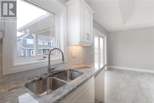 2566 Mayfair, Lasalle, ON - Indoor Photo Showing Kitchen With Double Sink