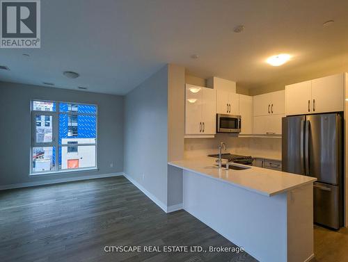 316 - 460 Gordon Krantz Avenue W, Milton, ON - Indoor Photo Showing Kitchen With Double Sink