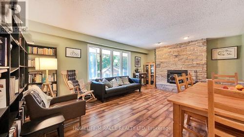 2927 Sunnidale 3/4 Side Road, Clearview, ON - Indoor Photo Showing Living Room With Fireplace