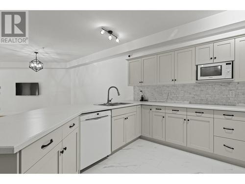 1905 Pandosy Street Unit# 101, Kelowna, BC - Indoor Photo Showing Kitchen With Double Sink