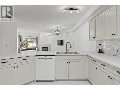 1905 Pandosy Street Unit# 101, Kelowna, BC - Indoor Photo Showing Kitchen With Double Sink