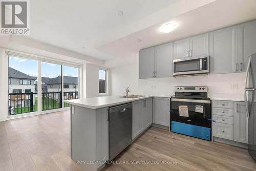 204 - 160 Densmore Road, Cobourg, ON - Indoor Photo Showing Kitchen With Upgraded Kitchen