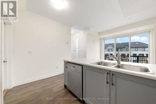 204 - 160 Densmore Road, Cobourg, ON - Indoor Photo Showing Kitchen With Double Sink